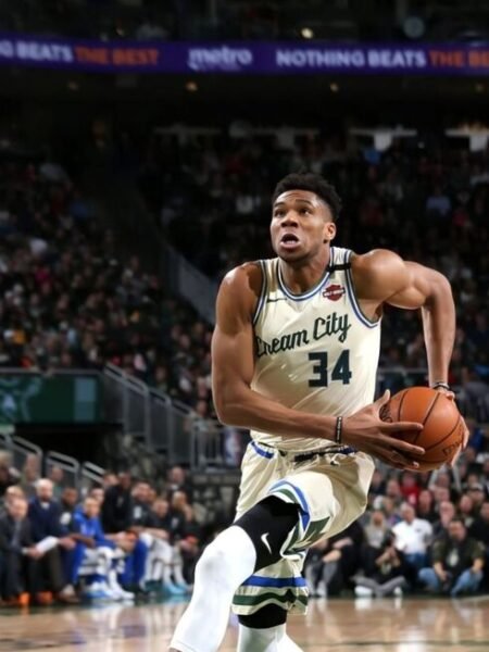 COLLECTABLE MATCH ISSUED SHIRT FRAMED 61cm X 81cm AND SIGNED BY THE 2X NBA MVP, 1X FINALS MVP GIANNI ANTETOKOUNMPO  HOUSTON ROCKETS - MILWAUKEE BUCKS 120-116 ( 03/08/20) COA GREY FLANNEL AND LOA JSA