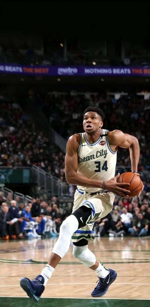 COLLECTABLE MATCH ISSUED SHIRT FRAMED 61cm X 81cm AND SIGNED BY THE 2X NBA MVP, 1X FINALS MVP GIANNI ANTETOKOUNMPO HOUSTON ROCKETS – MILWAUKEE BUCKS 120-116 ( 03/08/20) COA GREY FLANNEL AND LOA JSA