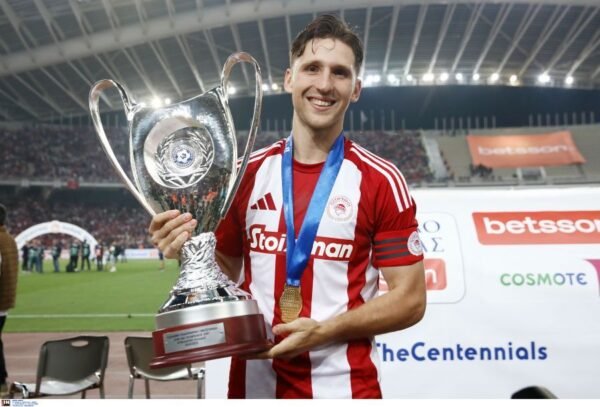 MATCH WORN SHIRT OF THE CAPTAIN  UNWASHED AND SIGNED COLLECTABLE FROM THE DOUBLE WINERS PANAGIOTIS RETSOS OFI – OLYMPIAKOS 0-2  ( 17/05/25) GREEK CUP FINAL COA FROM HELLENIC FOOTBALL FEDERATION
